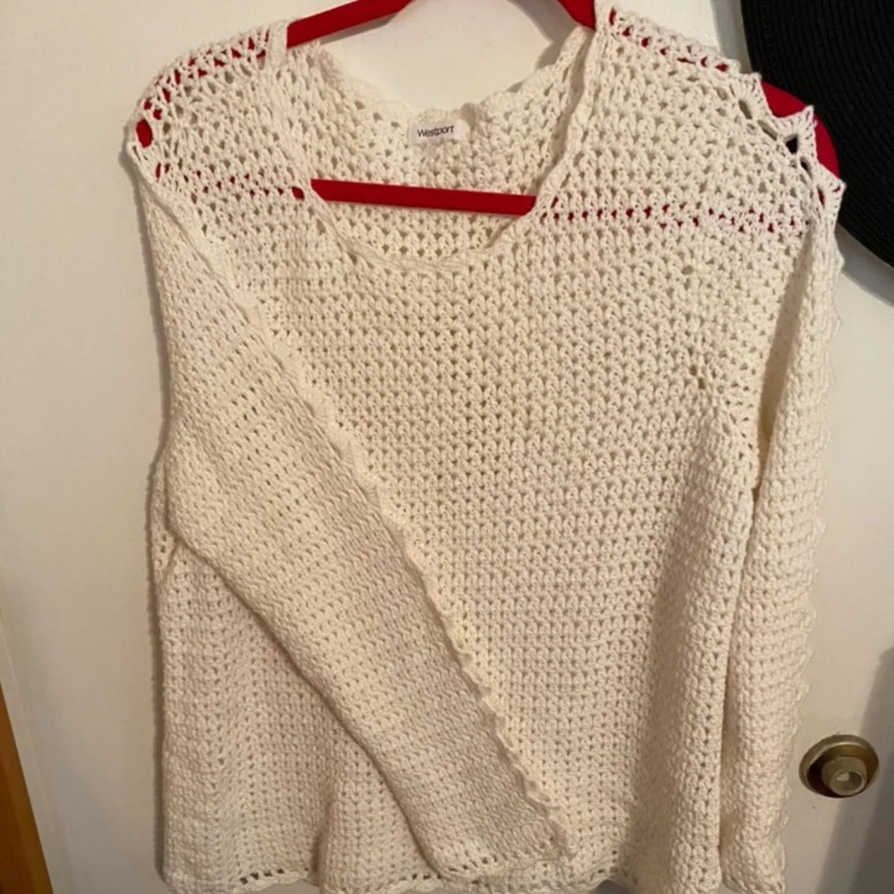soft white sweater never worn.